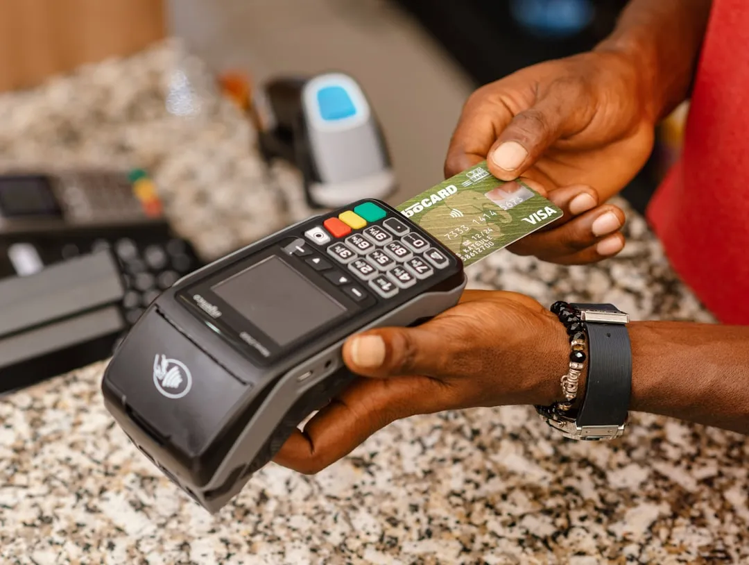 Using a debit card to make payment on a POS machine